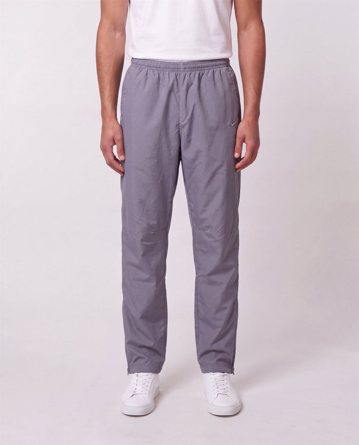 Nike Grey Trackpants, grey with straight leg, 90s vintage, worn by model, front view